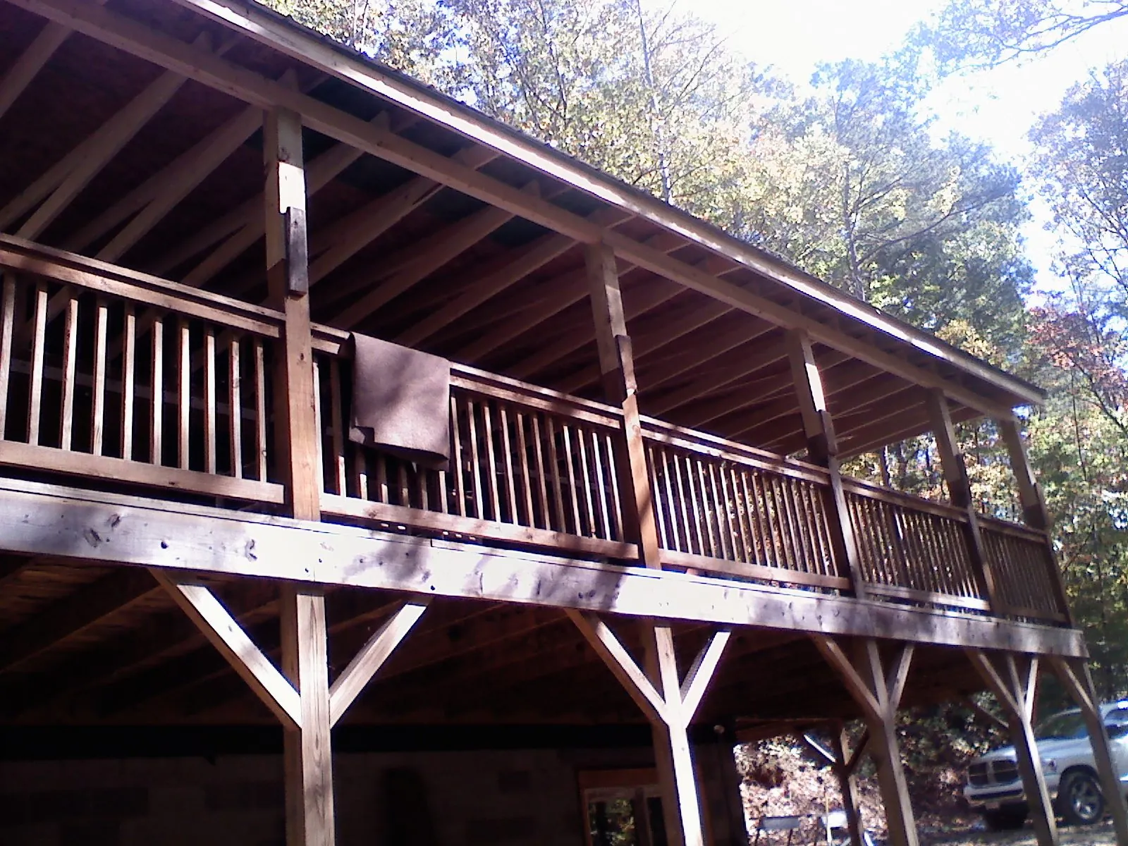 Timber framing under a new elevated porch and deck — Roof Leak Repair in Wausau by Roofing Brothers